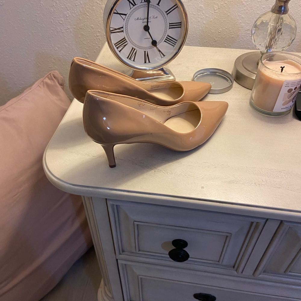 Tan Enzo Angiolini pumps. I call them a nude color.